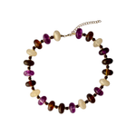 Haven multi-color beaded collar necklace featuring translucent purple, amber tortoiseshell, and cream beads