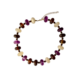 Haven multi-color beaded collar necklace featuring translucent purple, amber tortoiseshell, and cream beads